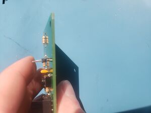 Finger holding header crocked.jpg